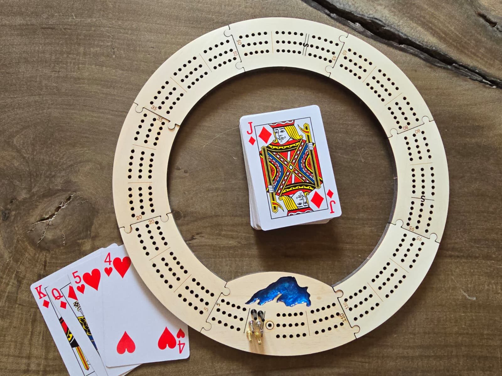 blue resin filled Lake Superior design travel cribbage ring